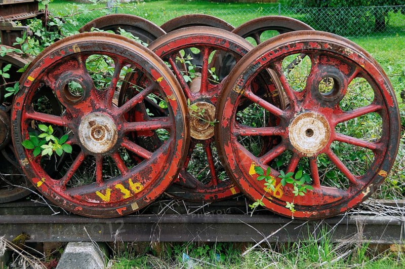 Discarded steam locomotive wheels on an overgrown siding, Ebermannstadt, Upper Franconia, Germany