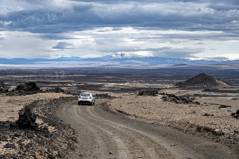 Car on a dirt road, volcanic landscape, barren landscape, Vatnajökull National Park, Icelandic Highlands, Iceland