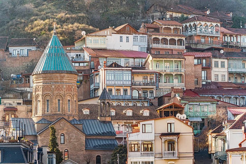 Unique charm of downtown Tbilisi, showcasing a blend of traditional and modern architecture. Vibrant facades and historical structures create a picturesque urban landscape
