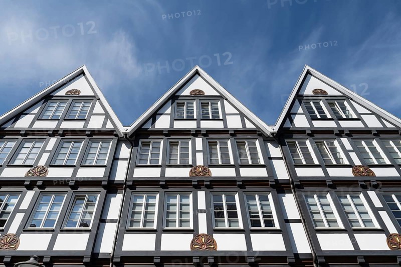 Several historic gabled houses side by side, half-timbered houses, pedestrian zone, Brüderstraße, Soest, Westphalia, North Rhine-Westphalia, Germany