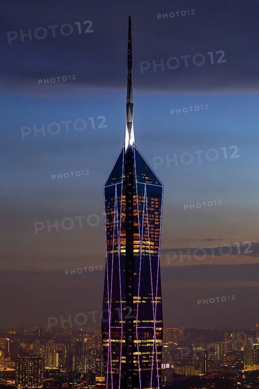 Merdeka 118, Merdeka Tower, neo-futuristic megatall skyscraper illuminated at dusk in capital city Kuala Lumpur, tallest building in Malaysia