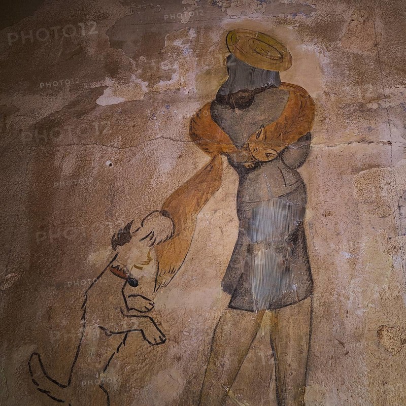 A mural depicts a stylish woman with a fox terrier, surrounded by a warm-toned, second-hand retro atmosphere, Lost Place, Tourtouras Mountain, WW2, World War II, German coastal battery PL 388, marine artillerymen, wall painting, graffiti, painter presumably Otto Meister, Diapori, Xirokambos, Leros, Dodecanese, Greek Islands, Greece