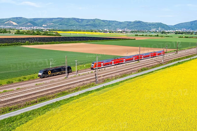 Aerial view of Deutsche Bahn DB Regio regional train Main-Neckar-Ried-Express on the Mannheim—Heidelberg railway line in Edingen, Germany