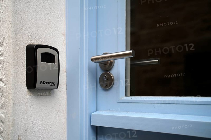 Doorknob next to Masterlock key safe, key box, key box for vacation rentals and airbnb, St Ives, Cornwall, England, Great Britain