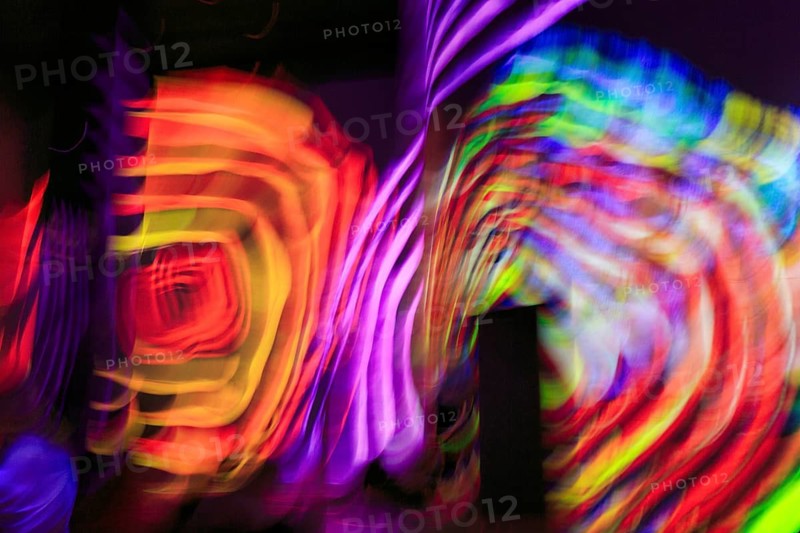 Immersive exhibition, digital art, light trails, light painting, abstract colorful projections on walls, motion blur, art museum, Port des Lumieres, Westfield Überseequartier, Hafencity, Hamburg, Germany