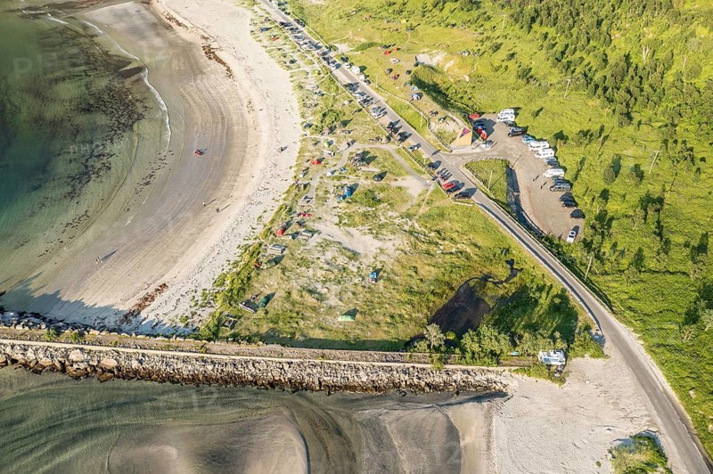 Aerial view of campsite at beach Ersfjordstranden, fjord Ersfjord, golden restroom, Senja island, Troms, northern Norway, Norway