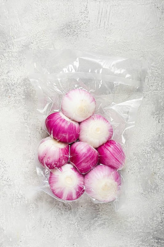 Red peeled onion, Spanish onion, sealed, for long-term storage, top view, no people