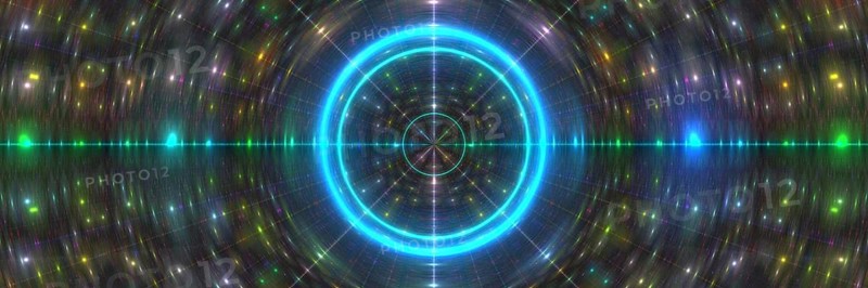 This image captures a vibrant abstract galaxy with luminous concentric circles and streaks of light in various colors emanating from the center, creating a visually captivating cosmic effect