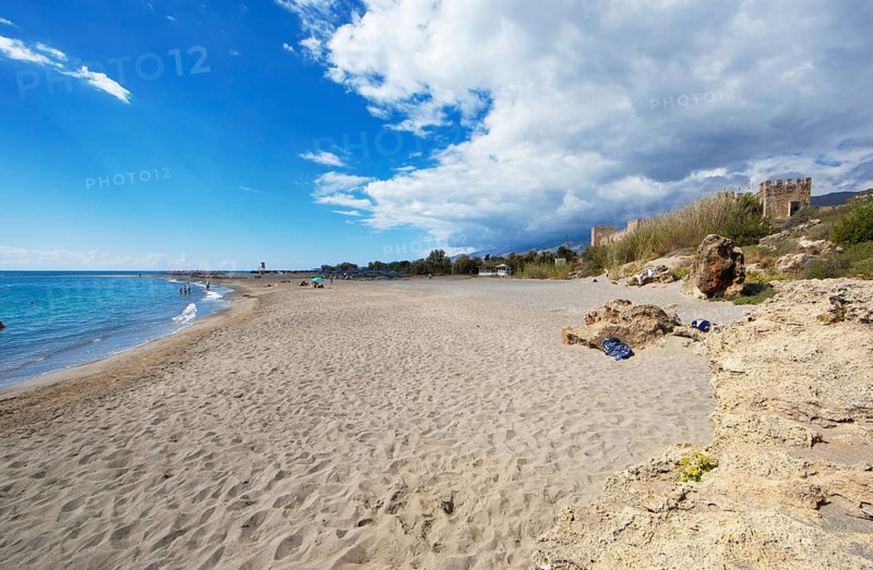 Beach in Frangokastello on the Libyan Sea, on the right the Venetian fortress, in the back the Lefka Ori or White Mountains, municipality of Sfakia, Chania Regional District, Crete, Greece