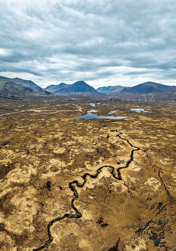 Panorama of Rannoch Moor from a drone over Loch Ba and Loch of the Armpit, A82 Highland Way, Argyll and Bute, West Highlands, Scotland, United Kingdom