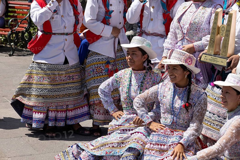 Arequipa, Peru, 2 February, 2026: Native indigenous people of Peru in National costumes perform dances and take images with people in Plaza de Armas in Arequipa, Peru
