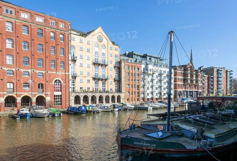 Apartments in converted industrial buildings, Redcliff Quay, Floating Harbour, River Avon, Bristol, England, UK