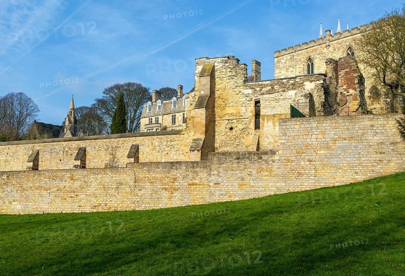 Walls of medieval Bishops' Palace from Temple Gardens park, city of Lincoln, Lincolnshire, England, UK
