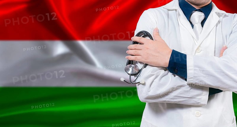 Hungarian national health system, Medical professional holding sthetoscope isolated