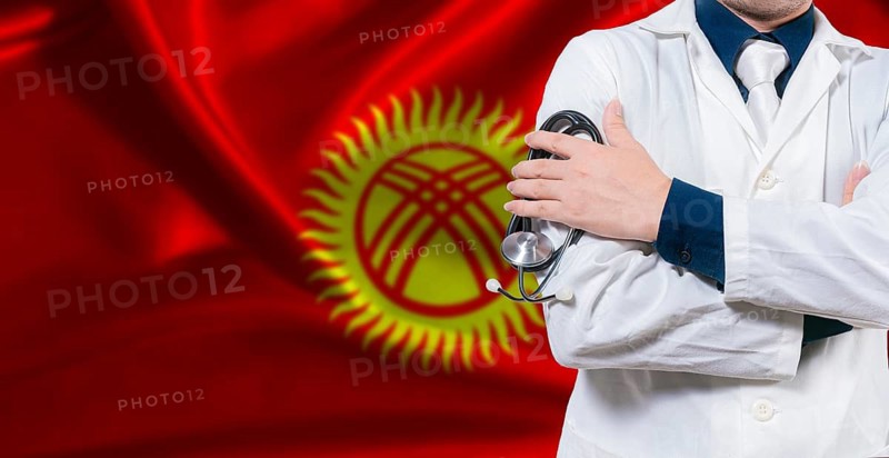 Kyrgyz national health system, Medical professional holding sthetoscope isolated