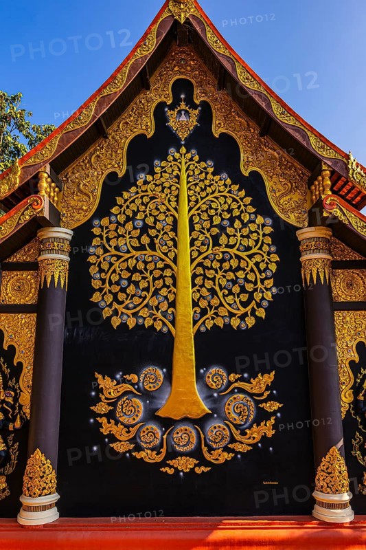 Gilded tree of life at the Buddhist temple Wat Phra That Don Phra Chan, near Lampang, Lampang Province, Thailand