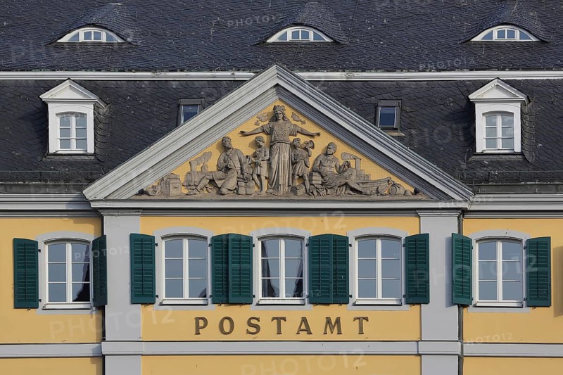 Baroque post office with tympanum and relief built in 1753, green shutters, inscription, main post office, Palais Fürstenberg, Münsterplatz, center, Bonn, North Rhine-Westphalia, Germany