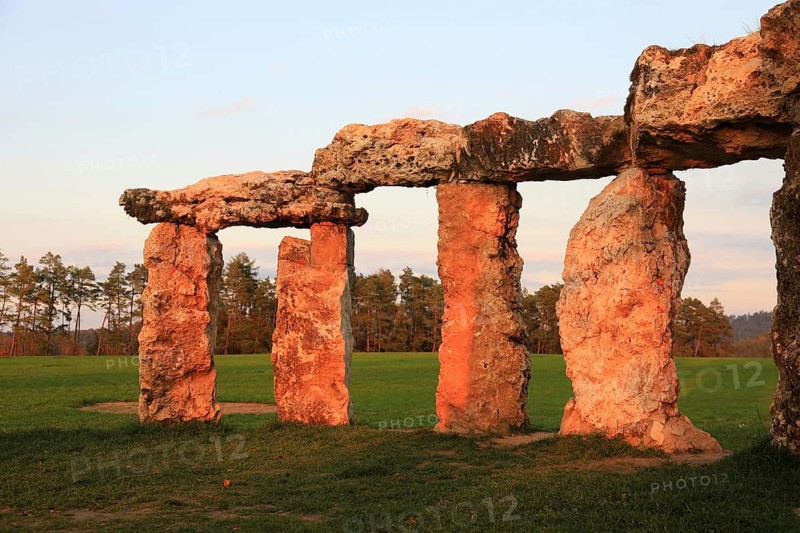 The Franconian Stonehenge in the evening light, permanent art installation made of boulders found during roadworks by Alexander Lämmlein near Tieferpölz in the district of Bamberg, Upper Franconia, Bavaria, Germany