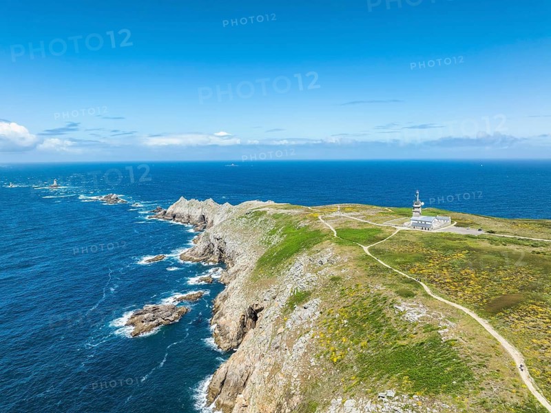 Aerial view of Pointe du Raz with the Sémaphore de la Pointe du Raz, on the left horizon the Phare de la Vieille lighthouse on a rocky island, Pointe du Raz, Finistère, Brittany, France