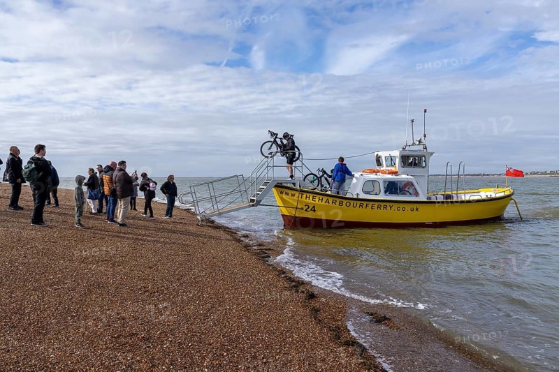 People, bikes, harbour ferry, beach, Felixstowe, England, Great Britain