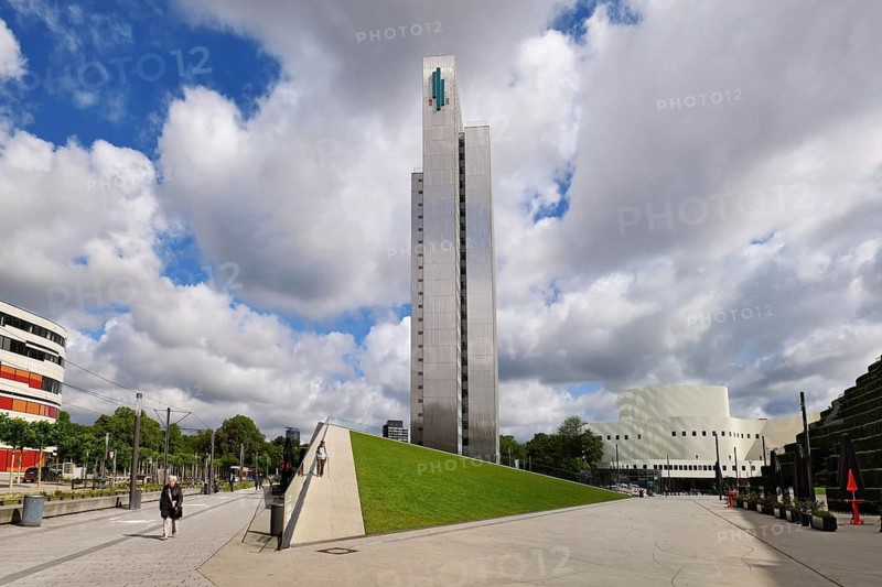 Düsseldorf, Germany - June 9th 2026: Narrow side view of Dreischeibenhaus, a modernist high rise office building and landmark in city center