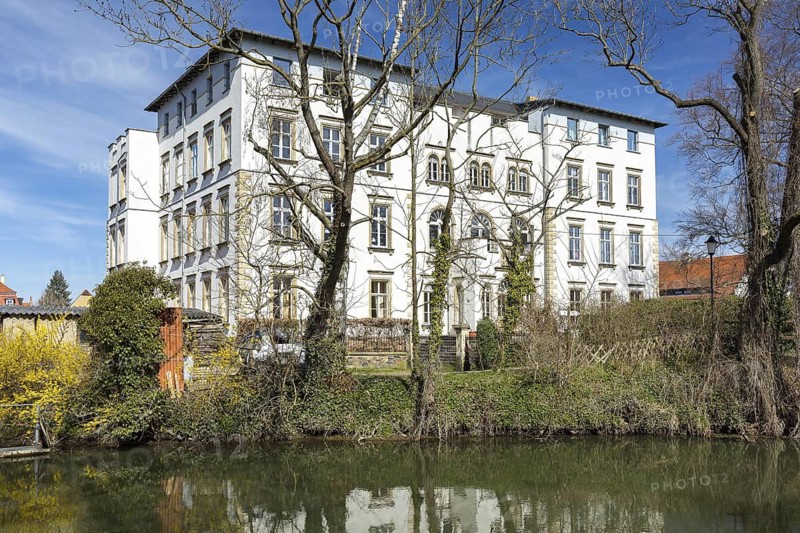 Park view of Lützschena Castle with White Elster, Leipzig, Saxony, Germany