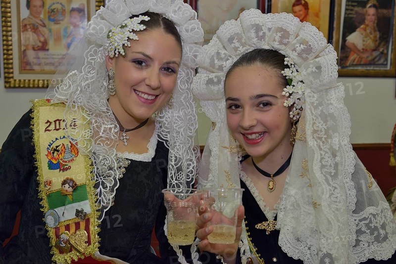 Girls wearing traditional dress at the opening of the Falla House by the Falla group "La Font" during the Las Fallas Spring Festival, Pego, Province of Alicante, Spain