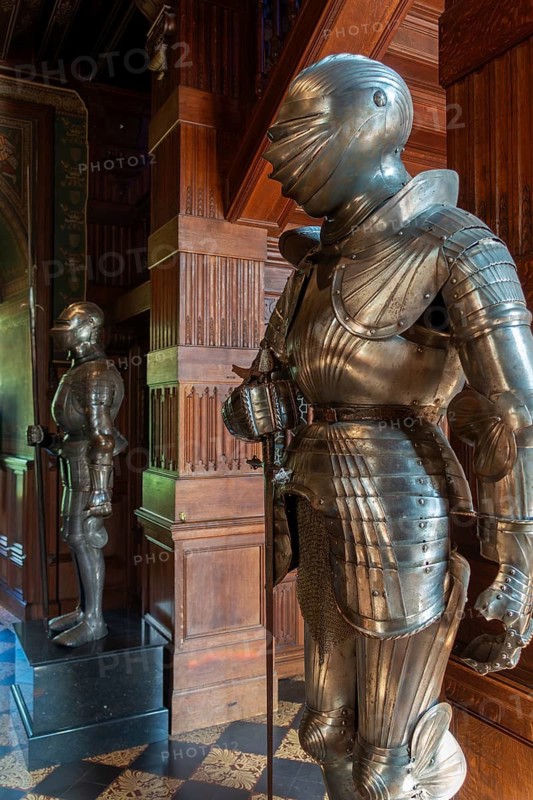 Suit of armour in the Guard Room in the Kasteel van Gaasbeek, medieval castle but renovated in the 19th century, Lennik, Flemish Brabant, Belgium