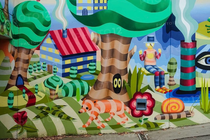 Graffiti, spray art, colorful pictures, public art, mythical creatures, fantastic creatures, human and animal beings, stripes, artistically designed entrance to the underground car park, concrete wall, Orschel-Hagen, district of Reutlingen, Baden-Württemberg, Germany