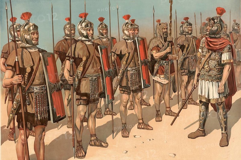 Group of Roman legionaries. The soldiers are shown in full gear, including red-crested helmets, pila, javelin, and rectangular scuta, shield. An Aquilifer, the Eagle Bearer, is also seen in the formation holding the field sign of the Legion, school picture, illustration, reproduction from a model from the 19th century. School picture, mural, authentic, file restored for optimal use, exact date of original unknown, historical