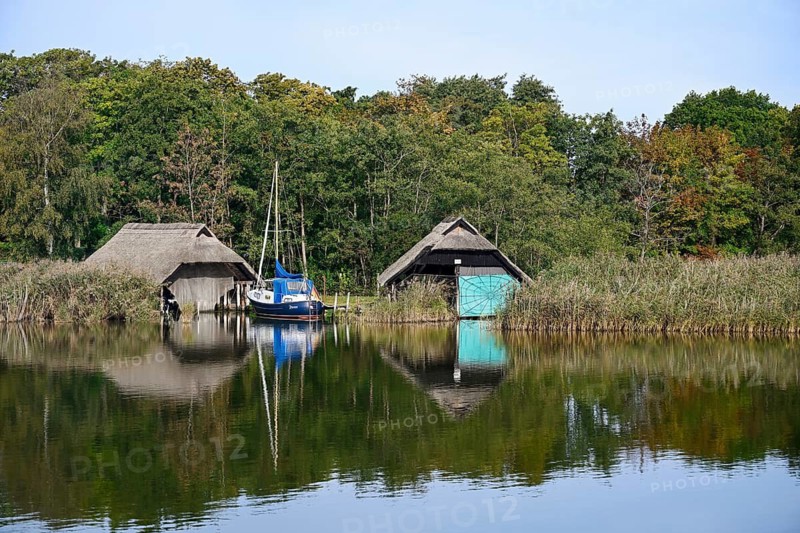 Thatched boat houses at Prerow harbour, Fischland-Darß-Zingst, Mecklenburg-Western Pomerania, Germany