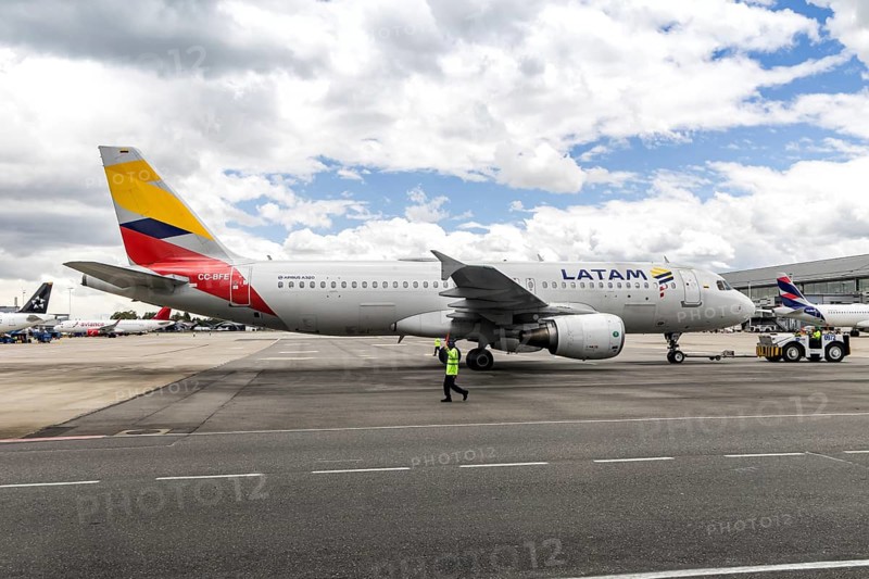 A LATAM Airbus A320 aircraft with the license plate CC-BFE at the airport in Bogota, Colombia