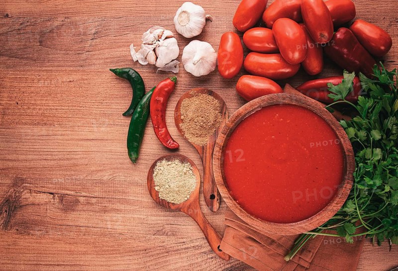 Georgian sauce, Satsebeli sauce, tomato and sweet pepper sauce, with spices, in a wooden bowl, homemade, no people