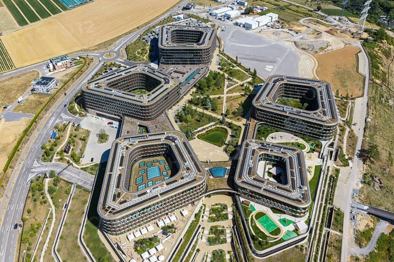 Reopening of the Schwarz Digits Campus of the Schwarz Group in Bad Friedrichshall. The IT solutions of tomorrow are to be worked on here. 3000 people work here, later there will be 5500 jobs. Aerial view of campus with modern architecture. Bad Friedrichshall, Baden-Württemberg, Germany