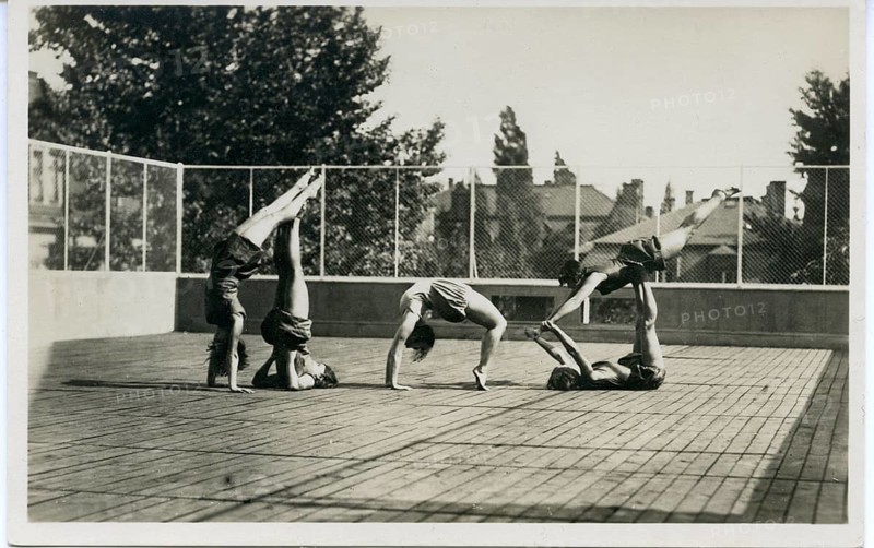 Children, girls, gymnastics, education, Dresden, Hellau, twenties, four people doing gymnastic exercises on a sunny outdoor area, Charlotte Rudolph, around 1928