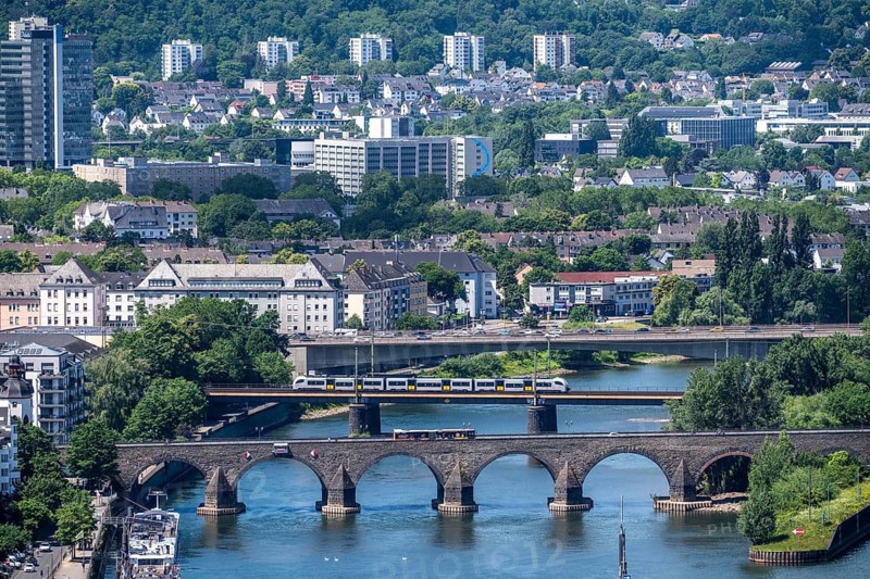 The bridges over the Moselle just in front of it flows into the Rhine, road and railway bridges, local train, bus, Koblenz, Rhineland-Palatinate, Germany