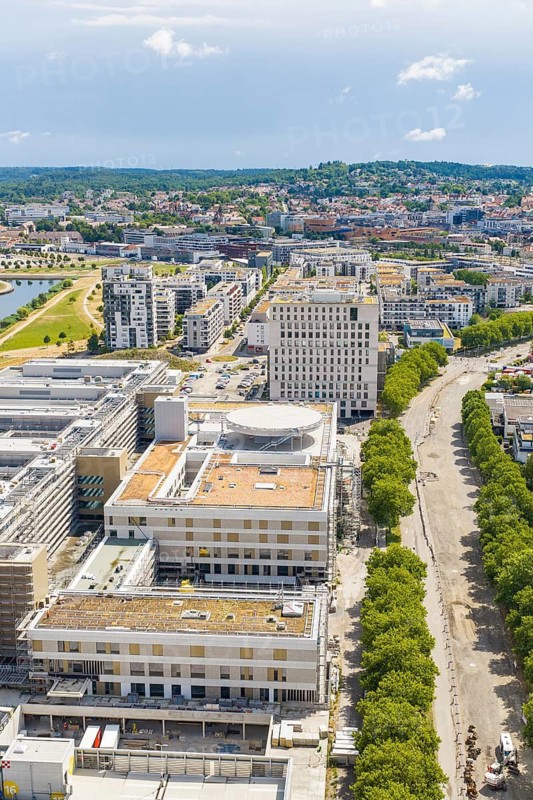 Urban office building with an avenue of trees in the foreground seen from a bird's eye view, Flugfeld, Böblingen, Germany