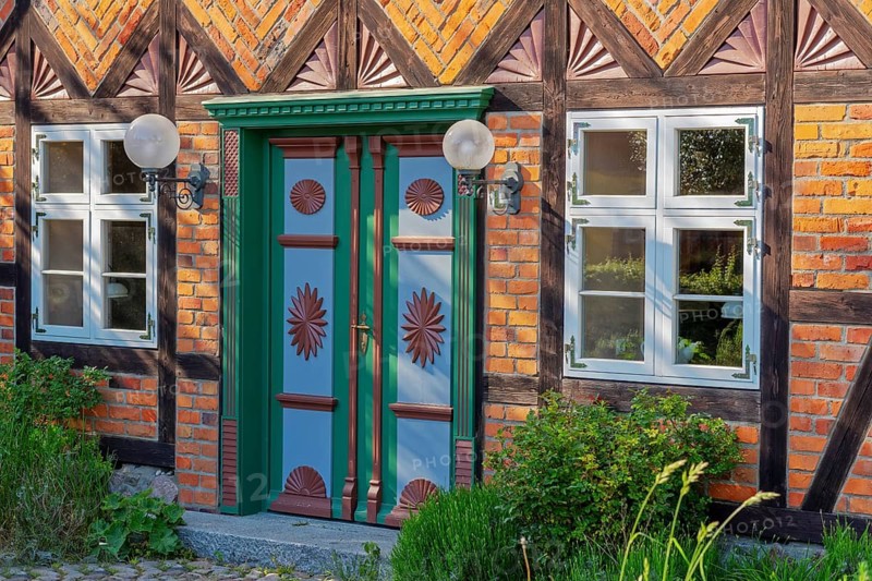 Historic half-timbered house with colorful door Born Darß Baltic Sea Germany