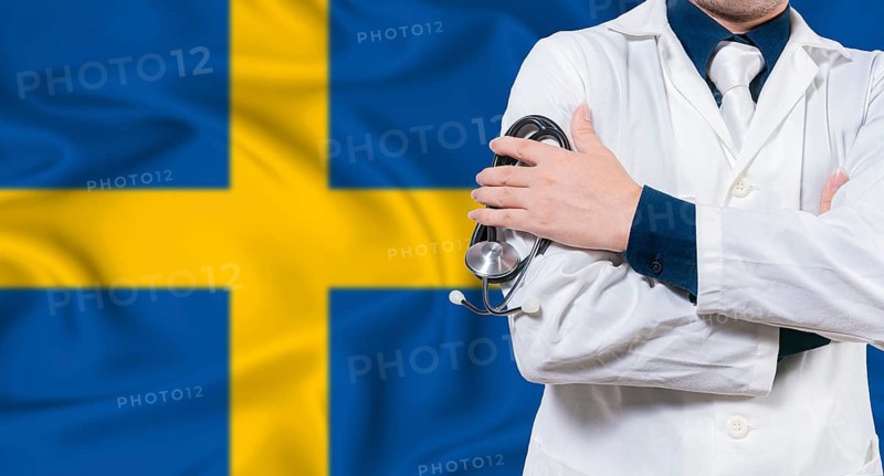 Swedish national health system, Medical professional holding sthetoscope isolated