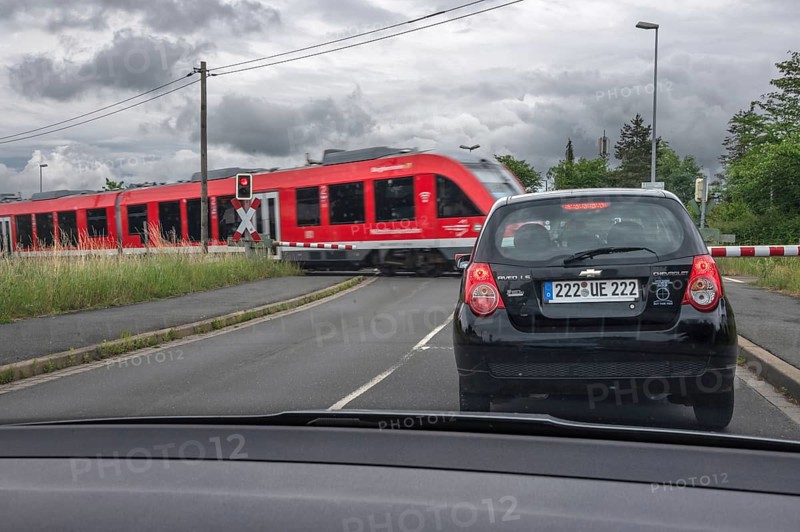 Gräfenbergbahn, suburban railway crosses a restricted level crossing, Eckental, Middle Franconia, Bavaria, Germany