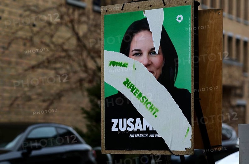 Election posters for the Bundestag election on 23 February 2025, Bündnis 90 Die Grünen, Annalena Baerbock, destroyed, defective, torn, vandalism, Zuversicht lettering, Fellbach, Baden-Württemberg, Germany