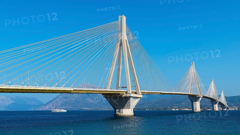 Modern bridge with turquoise water and clear sky, Rio-Antirrio cable car bridge, Patras, Peloponnese, Greece