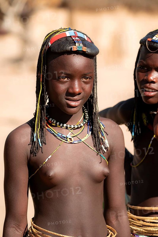 Portrait, brightly decorated girl of the Hakaona tribe, also Havakona or Hakawona, near Opuwo, Kunene, Namibia
