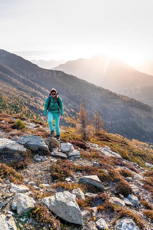 Hiker on the Venet in the morning light, view from Venet, Ötztal Alps, Tyrol, Austria