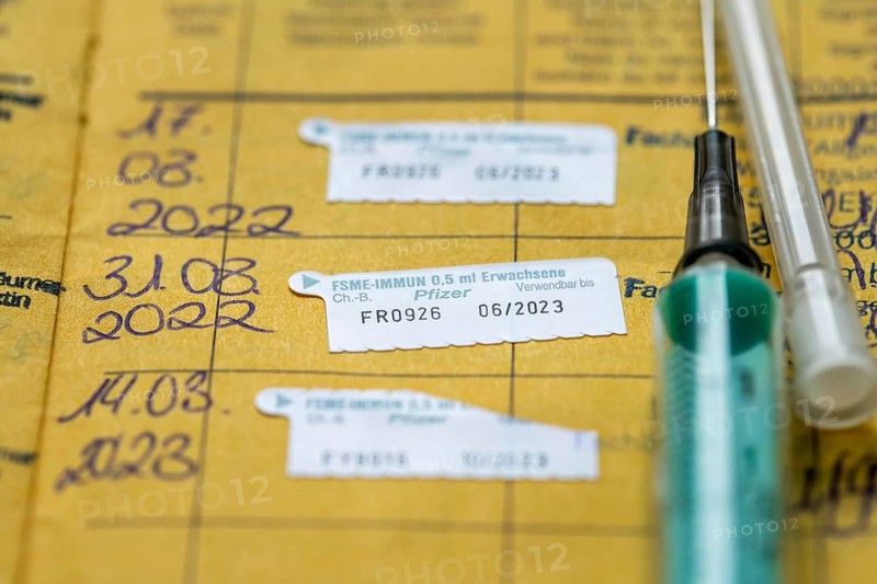 Symbolic picture vaccination book, injection, vaccination, against TBE, viral disease, transmitted by tick bites, 3 vaccinations are necessary to get protection against the consequences