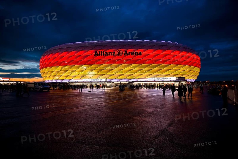 Night shot, stadium, illuminated, illuminated, in German national colours, black-red-gold, UEFA Nations League international match Germany vs. Netherlands, Allianz Arena, Munich, Bavaria, Germany