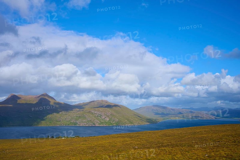 View of a lake with mountains in the background under a blue sky with clouds, Little Loch Broom, view point, Durnamuck, Garve, Scotland, United Kingdom, Great Britain