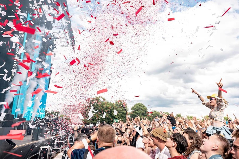 Rain of confetti at Finch's performance, festival goers sit on the shoulders of other festival goers, rock in the park on the Zeppelin field in Nuremberg on 06.06.2026