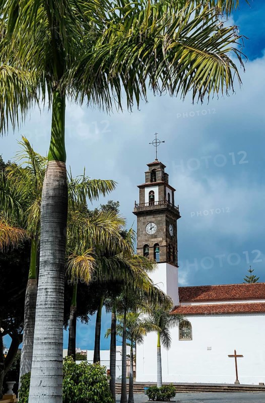 Buenavista del Norte, Santa Cruz, Tenerife, Canary Islands, Spain - The church Iglesia de Nuestra Senora de los Remedios is located right on the central village square Plaza de los Remedios and forms the religious and cultural center of the tranquil, picturesque village in the north of the island