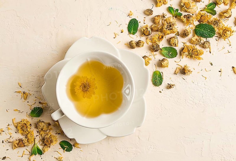 Chrysanthemum tea, drink, white cup, mint, chrysanthemum buds, close-up, no people